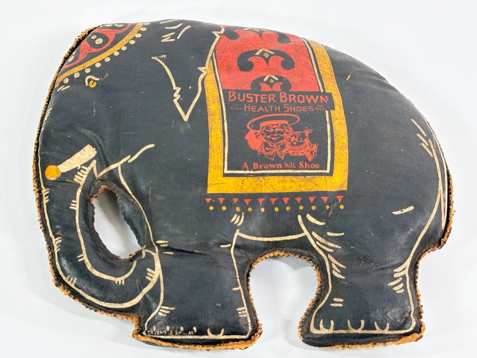BUSTER BROWN HEALTH SHOES ADVERTISING ELEPHANT PILLOW: REMAINS IN FAIR TO GOOD CONDITION, SHOWING TYPICAL WEAR.