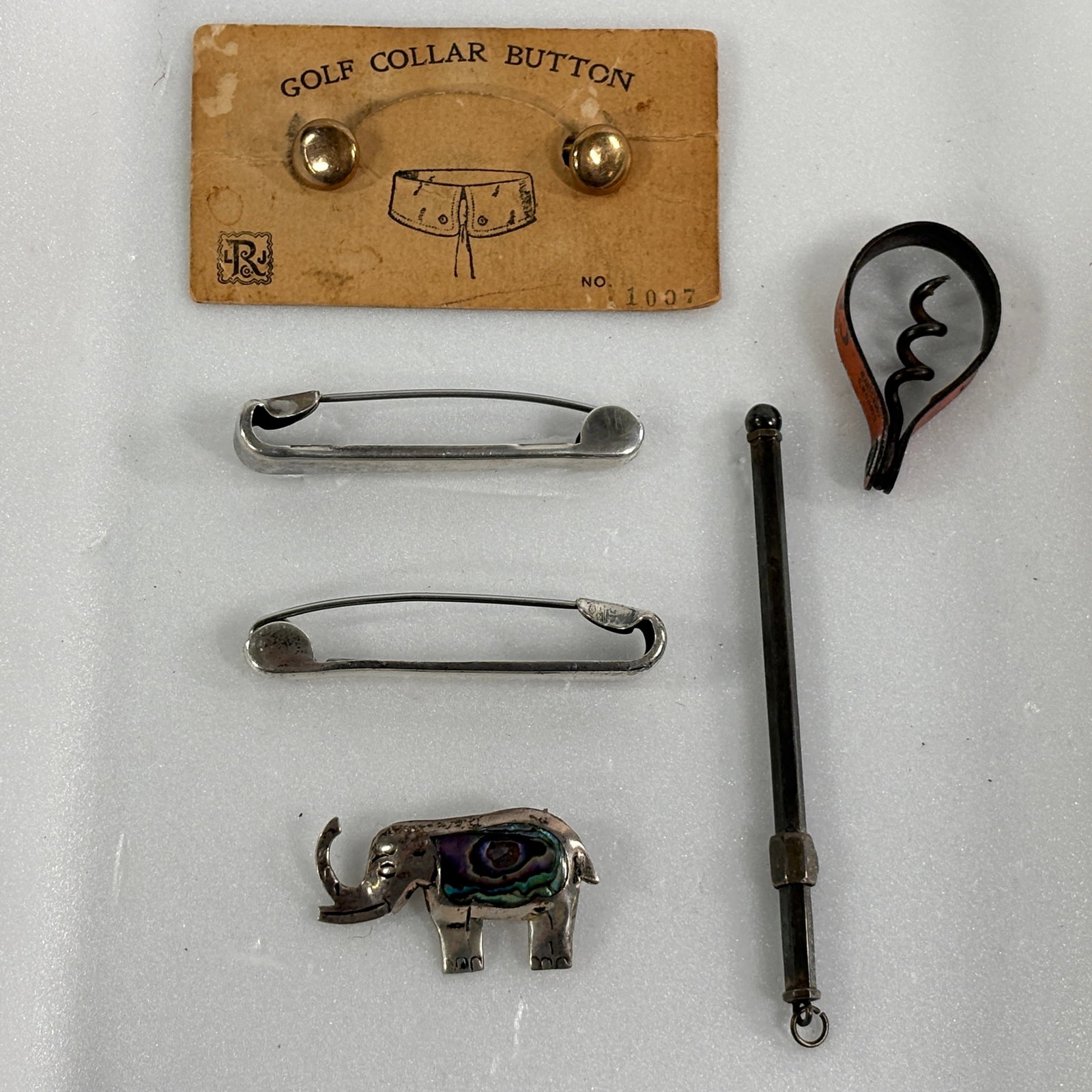 STERLING SILVER PINS, GOLF COLLAR BUTTONS & ADVERTISING: ALL REMAIN IN GOOD CONDITION, SHOWING SOME TYPICAL WEAR.