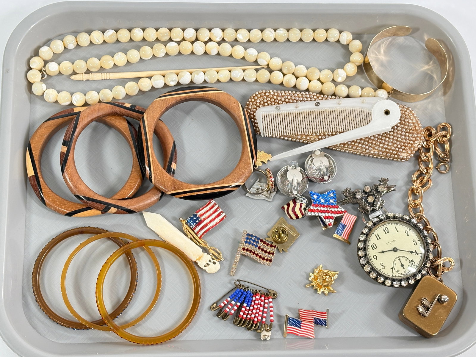 VARIOUS PATRIOTIC AND OTHER CUSTOM JEWELRY: ALL REMAIN IN GOOD CONDITION, SHOWING SOME TYPICAL WEAR.