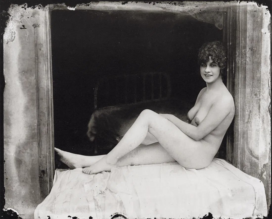 E.J. Bellocq (American, 1873-1949) Storyville Prostitute: E.J. Bellocq (American, 1873-1949) Seated Storyville Prostitute, 1912. Photolitho. Measures: 5 x 7 inches