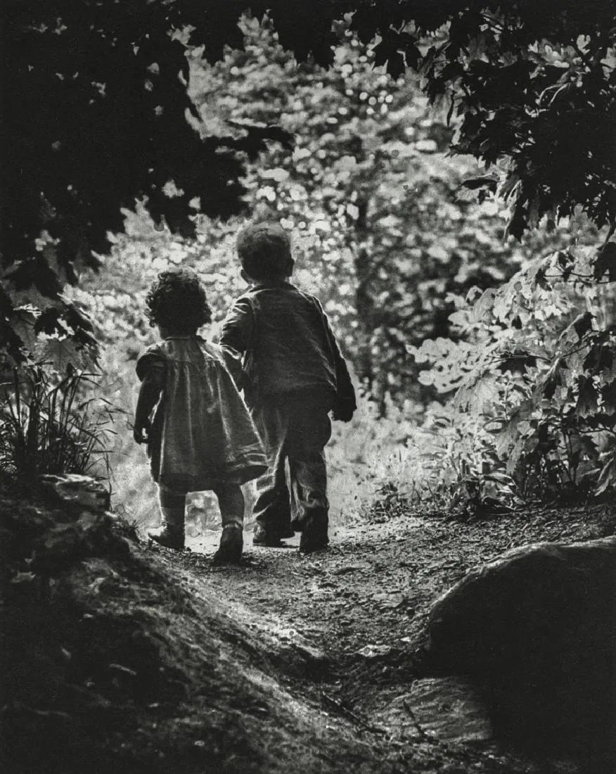 W. Eugene Smith - The Walk To Paradise Garden, 1947: W. Eugene Smith - The Walk To Paradise Garden, 1947. Gravure Print. Measures: 5 3/4 x 7 1/4 inches.