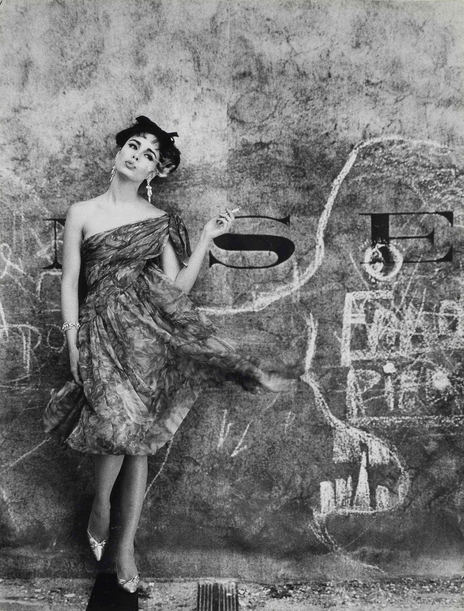William Klein (b. 1928) Model & Graffiti: William Kelin (b. 1928) Moden & Graffiti. Photoprint. Measures: 15 3/4 x 12 inches