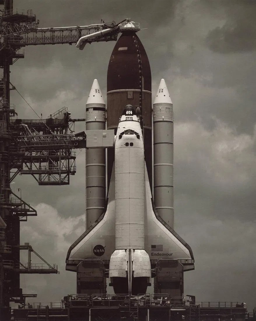 Dan Winters - Endeavor on Her Pad, May 15th, 2011: Dan Winters - Endeavor on Her Pad, May 15th, 2011. Photolitho. Measures: 9 x 11 1/3 inches.