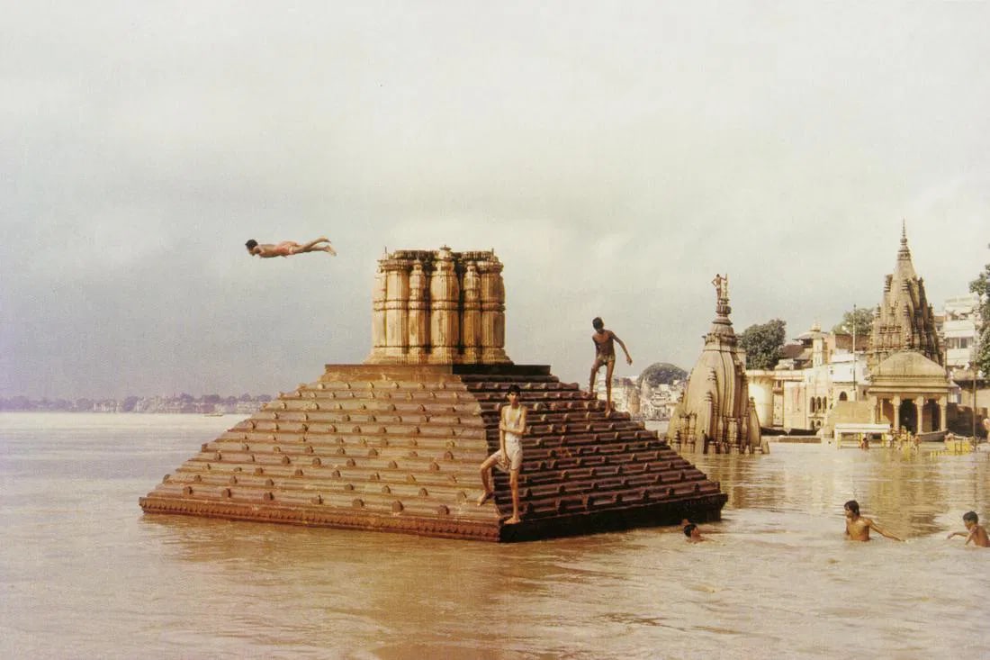 Raghubir Singh - Man Diving, Ganges Floods, 1985: Raghubir Singh - Man Diving, Ganges Floods, 1985. Photolitho. Measures: 7 1/2 x 5 inches.