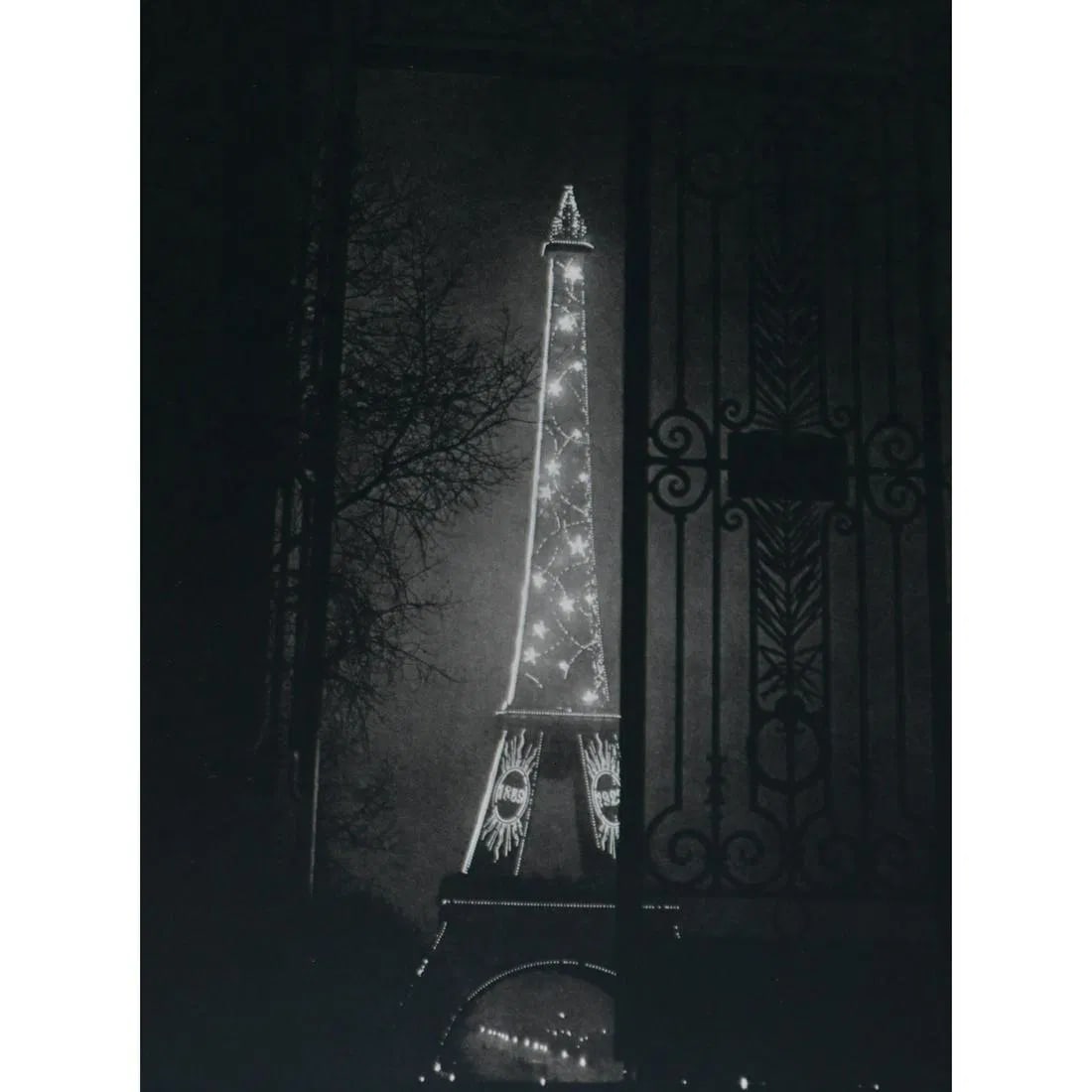 Brassai - Eiffel Tower at night: Brassai - Eiffel Tower at night. Gravure Print. Measures: 9 1/2 x 7 1/4 inches.