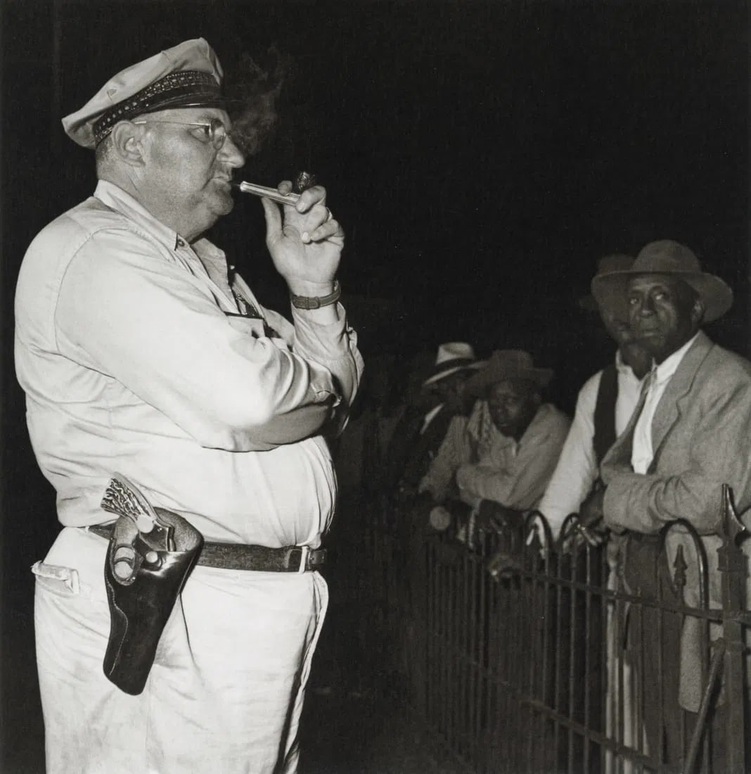 Sam Shaw - Sheriff at Voting Registration Site, 1946: Sam Shaw - Sheriff at Voting Registration Site, 1946. Photolitho. Measures: 7 1/2 x 7 3/4 inches.