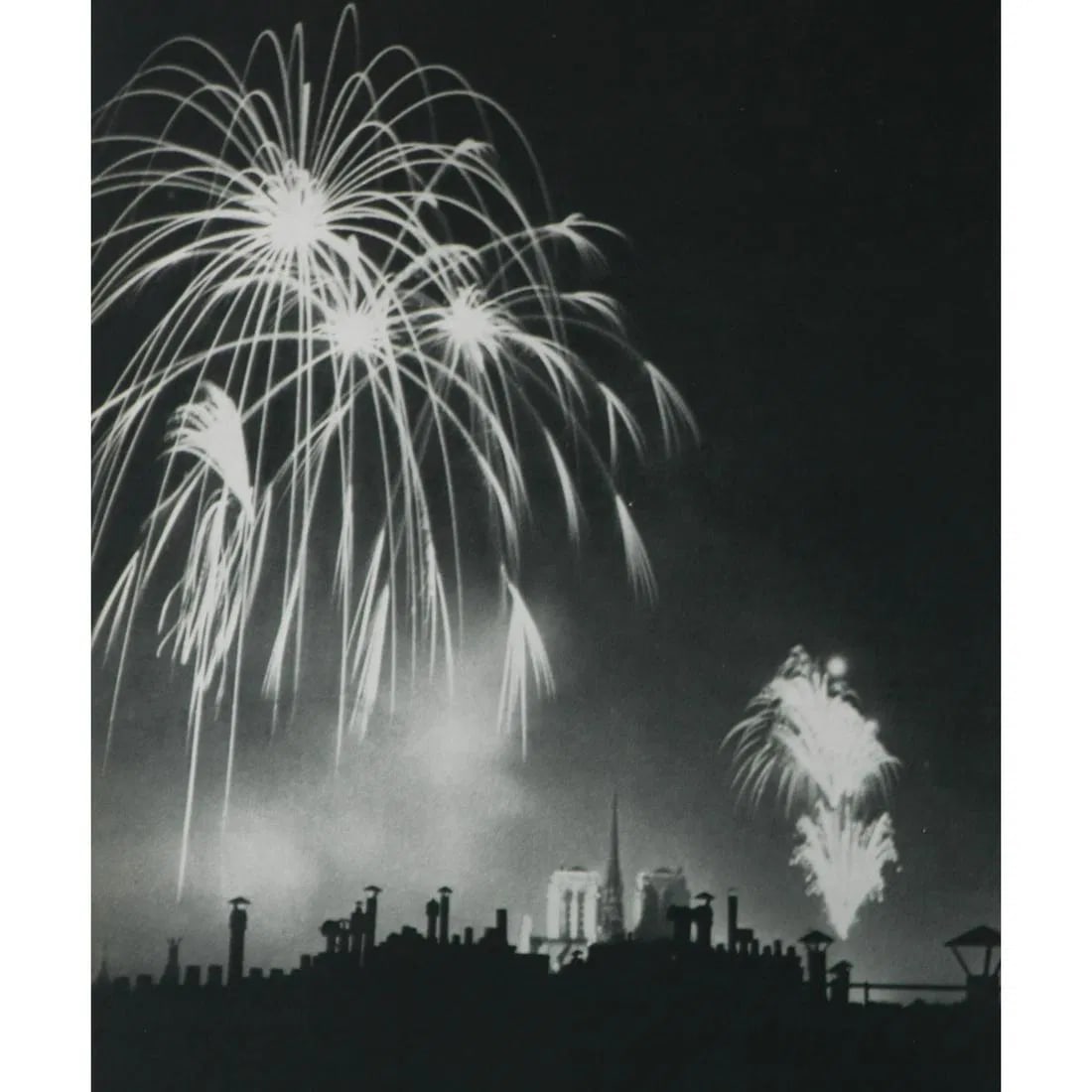 Brassai - Fireworks over Notre Dame: Brassai - Fireworks over Notre Dame. Gravure Print. Measures: 9 1/4 x 7 1/4 inches.