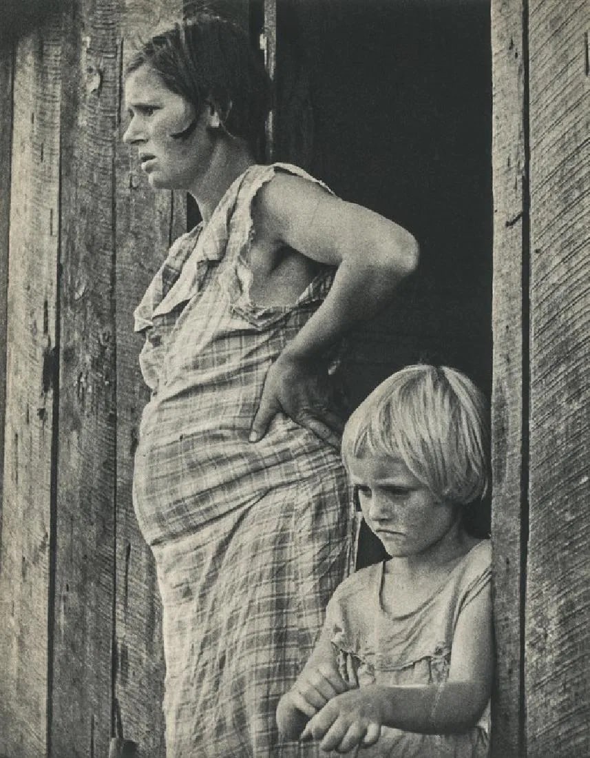 Arthur Rothstein - Wife & child of sharecropper, 1935: Arthur Rothstein - Wife & child of sharecropper, 1935. Gravure Print. Measures: 7 x 9 1/4 inches.
