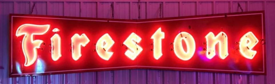 Firestone Bowtie Neon Porcelain Sign: Firestone Bowtie neon porcelain sign. Marked Bellows Electric Sign Company Lima, Ohio. Single Sided two piece porcelain sign with double script neon letters. Measures 177x45 Presents in very nice cond