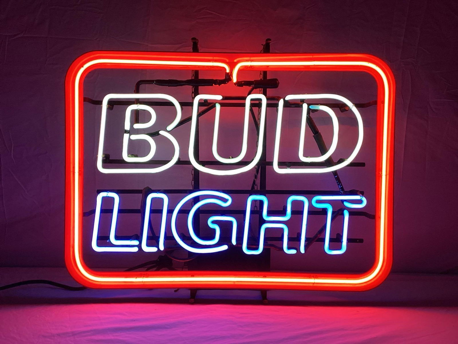 Bud Light Neon Sign: Bud Light neon sign. Complete with original transformer and dated 1991. Presents in nice condition. Measures 27 x 24. Oil Capital Collectibles will not ship this item. Pick-up before 10:00am Sunday 1/