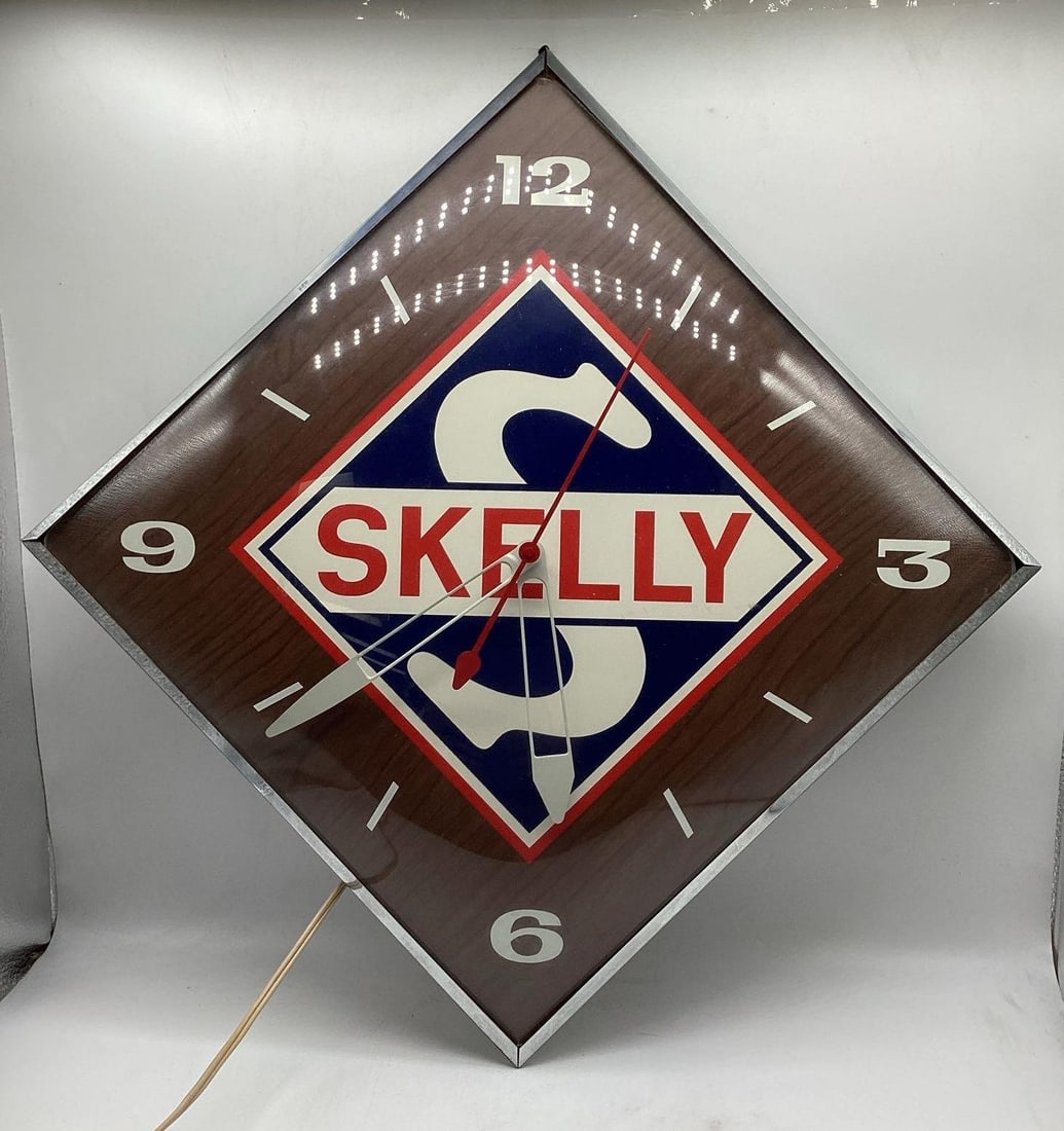 Skelly Electric Clock: Skelly Electric Clock made by PAM. Presents in nice original condition and works great. Measures 15x15.