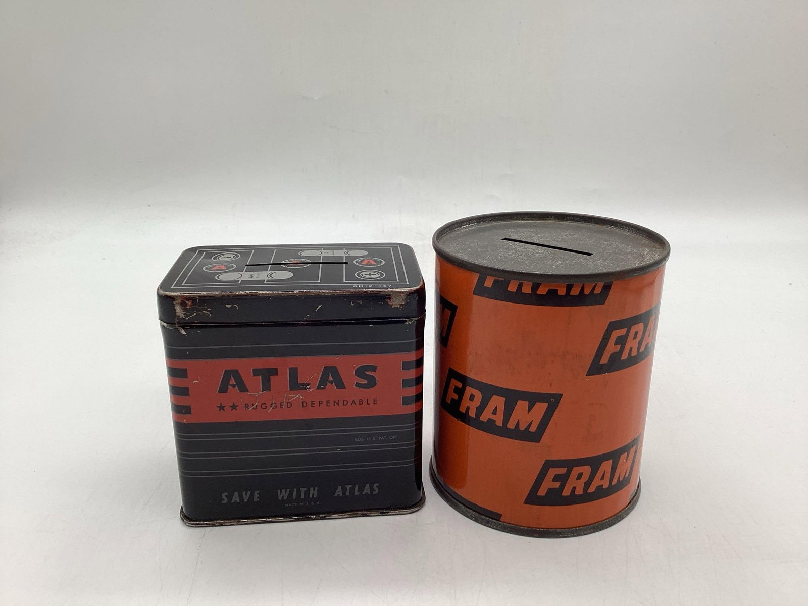 Atlas Tire and Fram Filter Coin Banks: Atlas Tire and Fram Filter Coin Banks. Measures 2 x 3 x 3 and 3 x 3. 