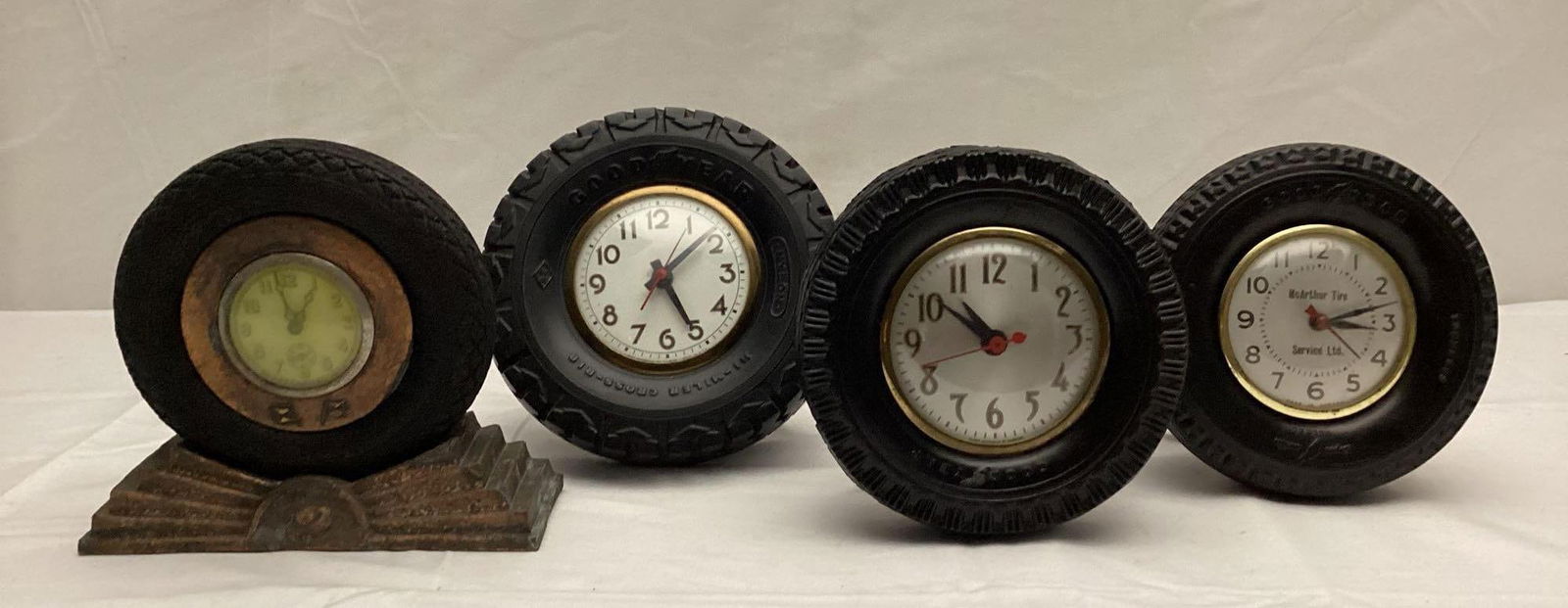 Four Tire Ashtray Desk Clocks (1 of 9)