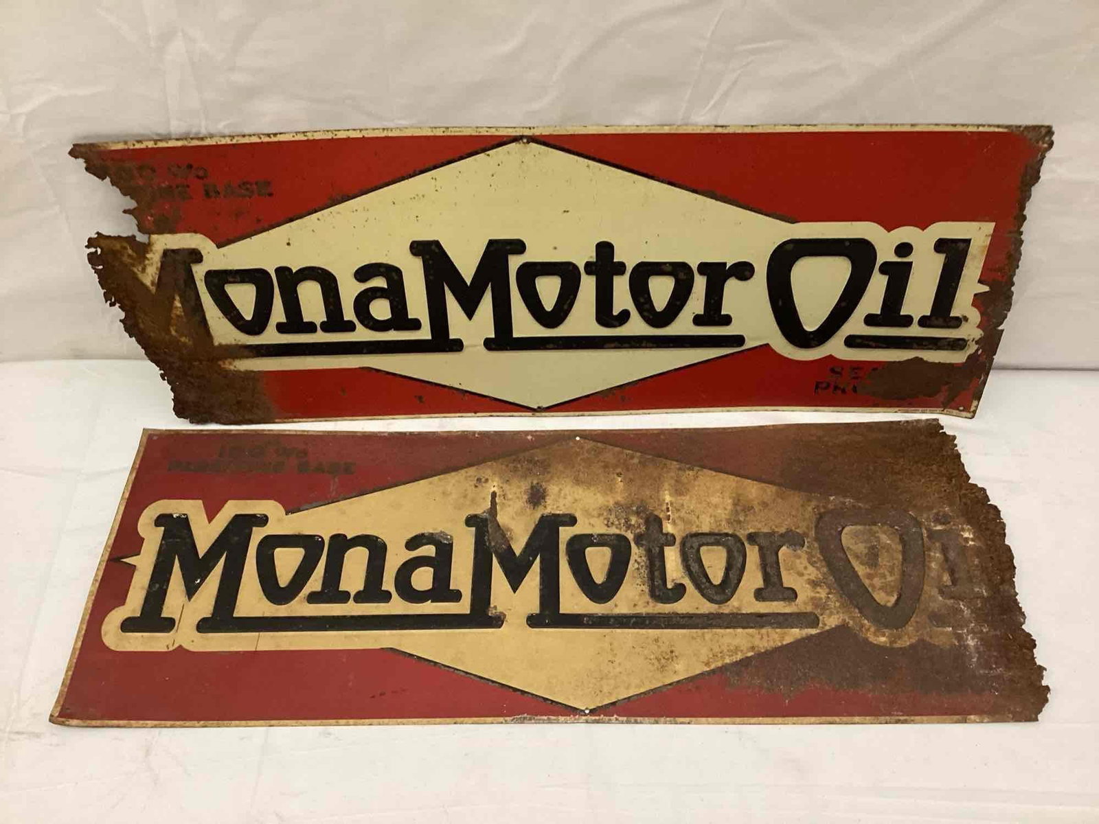 Two Mona Motor Oil Tin Tacker Signs (1 of 2)