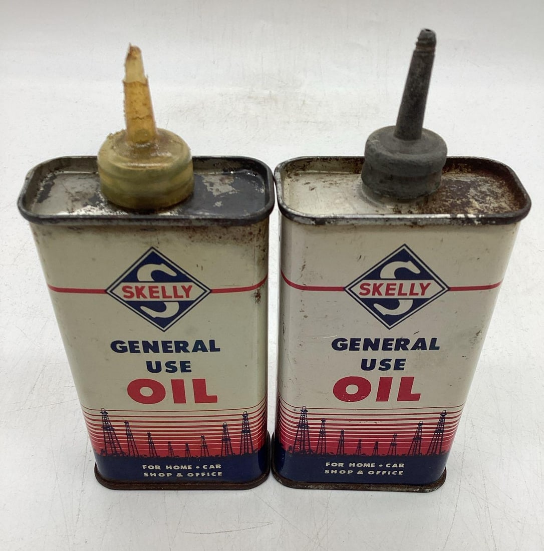 Two Skelly Handy Oilers: Two Skelly Handy Oilers. One is a lead top.