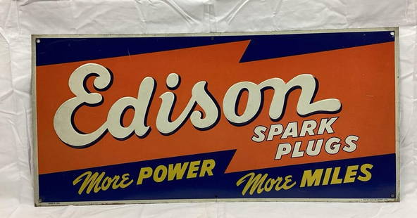 Rare Edison Spark Plugs Metal Sign: Edison Spark Plugs Metal Sign. "Reads More Power More Miles".? Features vibrant color and presents with light wear.? Marked Matthews Co Detroit MI.? Measures? 23.75x11.25