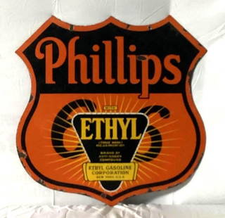 30" Phillips 66 Ethyl Porcelain Shield Sign: 1930's Phillips 66 Ethyl double sided porcelain shield shaped curb sign. Presents with nice color, some chips and side two has a stain. Measures 30".