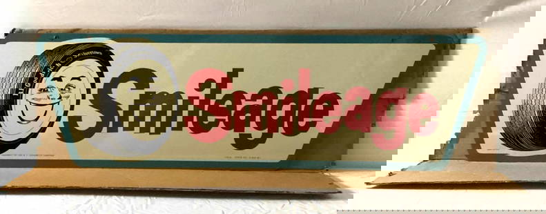 Smileage double sided painted metal sign.  Features amazing graphics, the original shipping box and: Smileage double sided painted metal sign. Features amazing graphics, the original shipping box and is marked AM 2-60.. Presesents in excellent new old stock condition.
