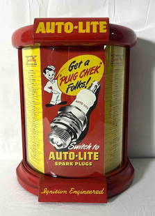 Auto-Lite Spark Plug Counter Displays: Auto-Lite Spark Plug counter display cabinet. Advertisement behind curved original glass reads "Get a Plug Check Folk's" and has specifications for major car brands. Presents with very nice original g