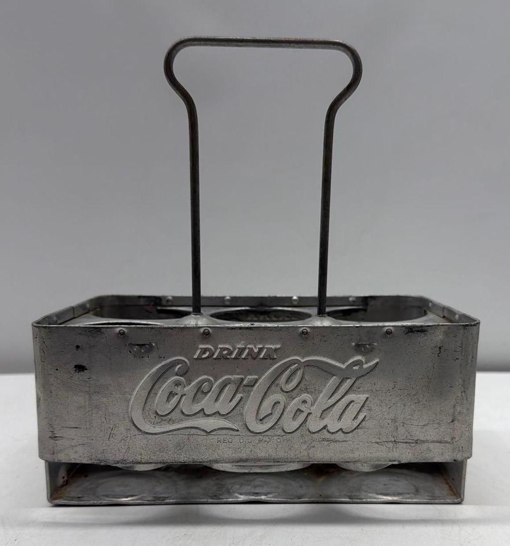 Early Coca-Cola Aluminum Six Pack Carrier: Early Coca-Cola Aluminum Six Pack Carrier. Measures 8.5x10
