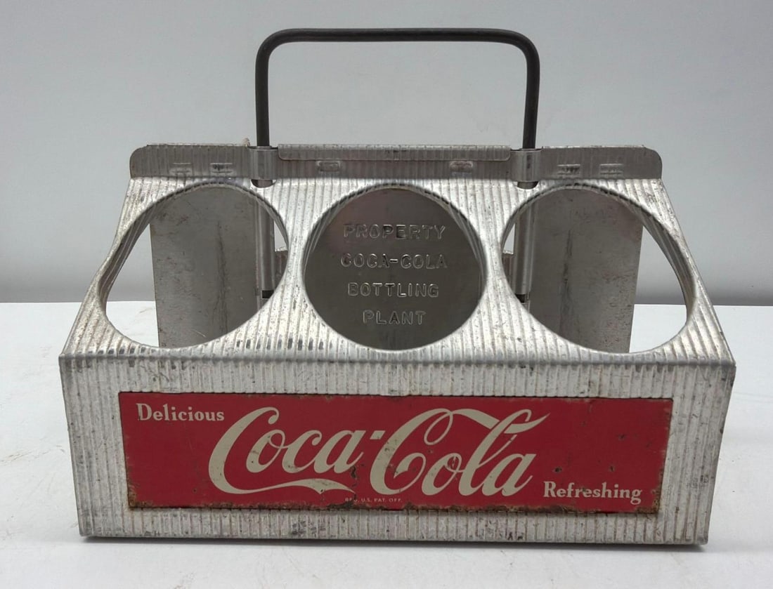 Coca-Cola Metal Six Bottle Carrier: Coca-Cola Metal Six Bottle Carrier. Measures 8x5.5x6