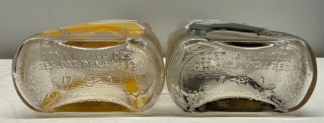 Two Black Raspberry Figural Soda Bottles - 6