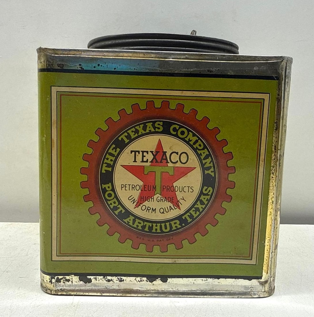 1920's Texaco Transmission Lubricant 5lb Square Can: Texaco Transmission Lubricant five pound square grease tin.? Features transmission gears outlining the "Port Arthur" star logo, dates to the 1920's and has branding on all sides including lid.? Presen