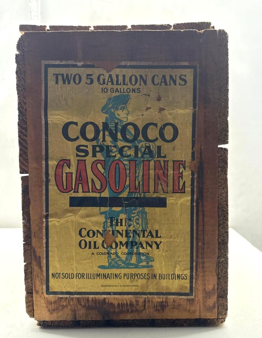 1920's Conoco Minuteman Wood Crate: Conoco Minuteman wood crate with paper label.? Hold two five gallon square flat?top Conoco Minuteman Motor Oil Cans.? Presents with nice color and some wear. Amazing survivor piece.
