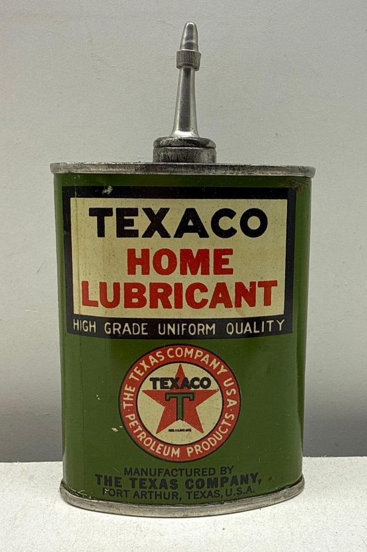 1920's Texaco Home Lubricant Handy Oiler: Texaco Home Lubricant oiler. Features lead top, marked Port Arthur and early Texaco logo and dates to the 1920's. Presents with strong color and light wear.