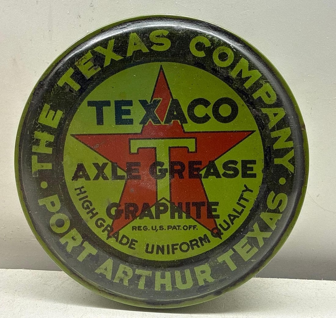 Texaco Axle Grease One Pound Tin: Texaco Axle Grease one pound tin. Early piece dates to the 1910's and features branding on all sides along with a lid with early "Port Arthur" logo. Presents with nice color and light wear.