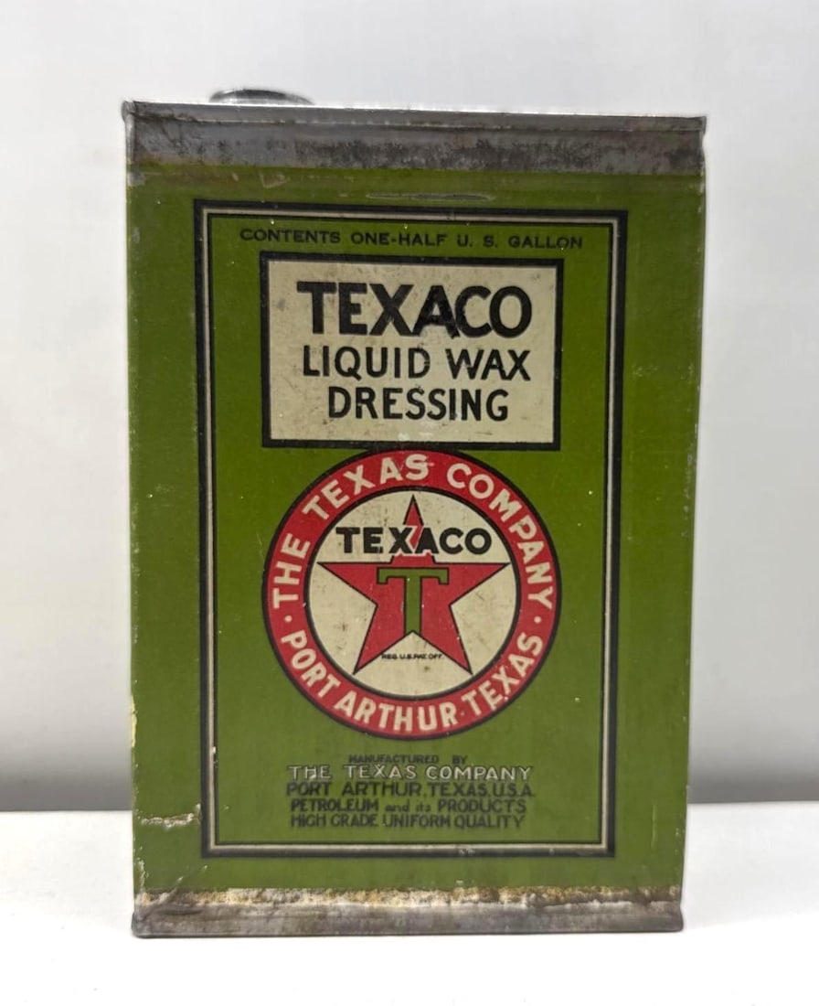 Texaco Liquid Wax Dressing One Gallon Can: Texaco Liquid Wax Dressing one gallon can.? Early can dates to the 1920's features square corners and Texaco "Port Arthur" branding on two sides.? Presents with nice color and light wear.