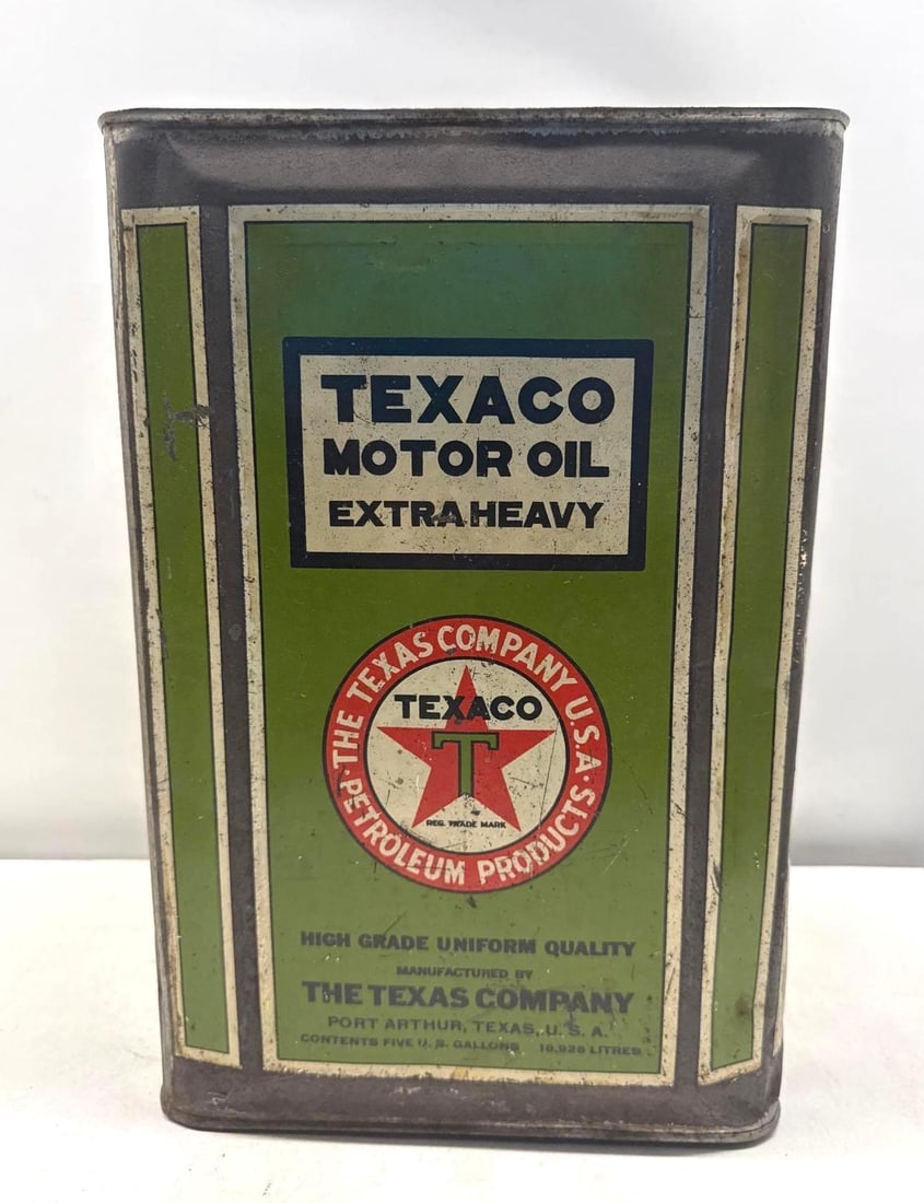 1920's Texaco Extra Heavy Motor Five Gallon Square Oil Can: Texaco Extra Heavy Motor Oil square flat top can.? Dates to the 1920's and features early Texaco Port Arthur logo on all four sides.? Presents with strong color and some wear.