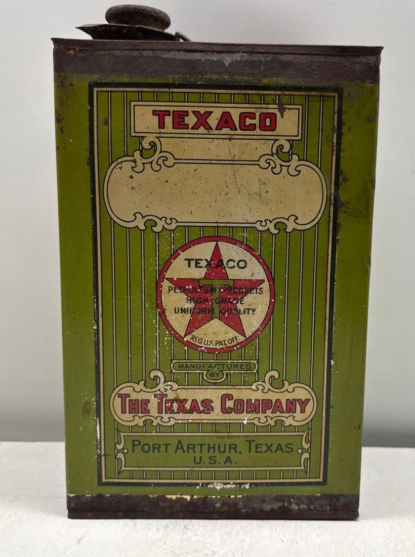 1910's Texaco One Gallon Oil Can: 1910's Texaco One Gallon Oil Can. Marked The Texas Company Port Arthur, Texas and features pin strip & scroll logo. Presents with good color and light wear.