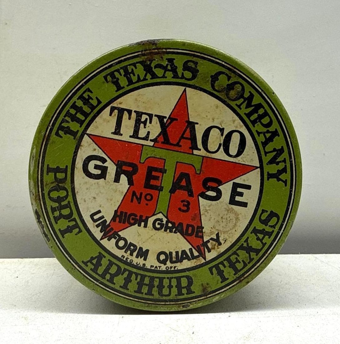 Early Texaco One Pound Grease Can: Early Texaco One Pound Grease Can. Features branding on all sides and lid including early "Port Arthur" star logo with curved block lettering boarder. Presents with nice color and some wear.