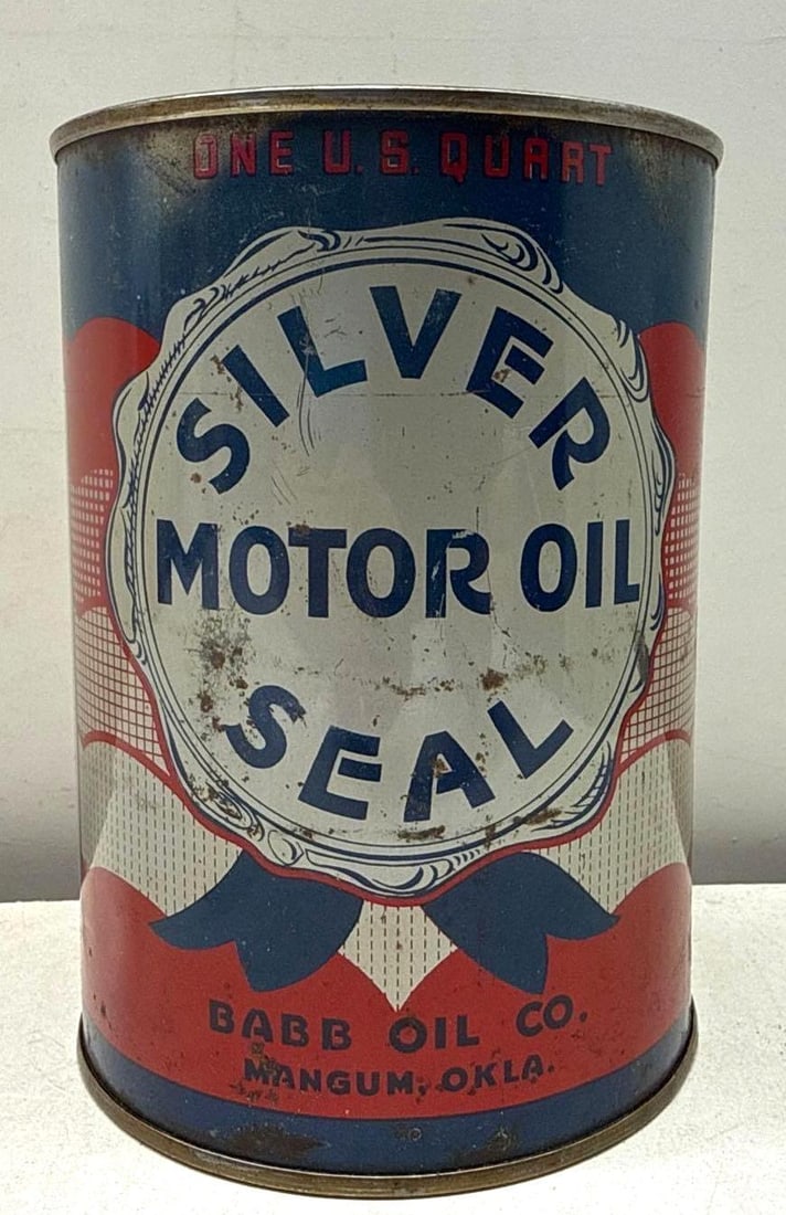 Silver Seal Motor Oil Babb Oil Company Mangum, OK: Silver Seal Motor Oil quart can from the Babb Oil Company of Magnum, Oklahoma.? Feautures Silver Ribbon? and Seal design.? Presents with nice color and some wear.