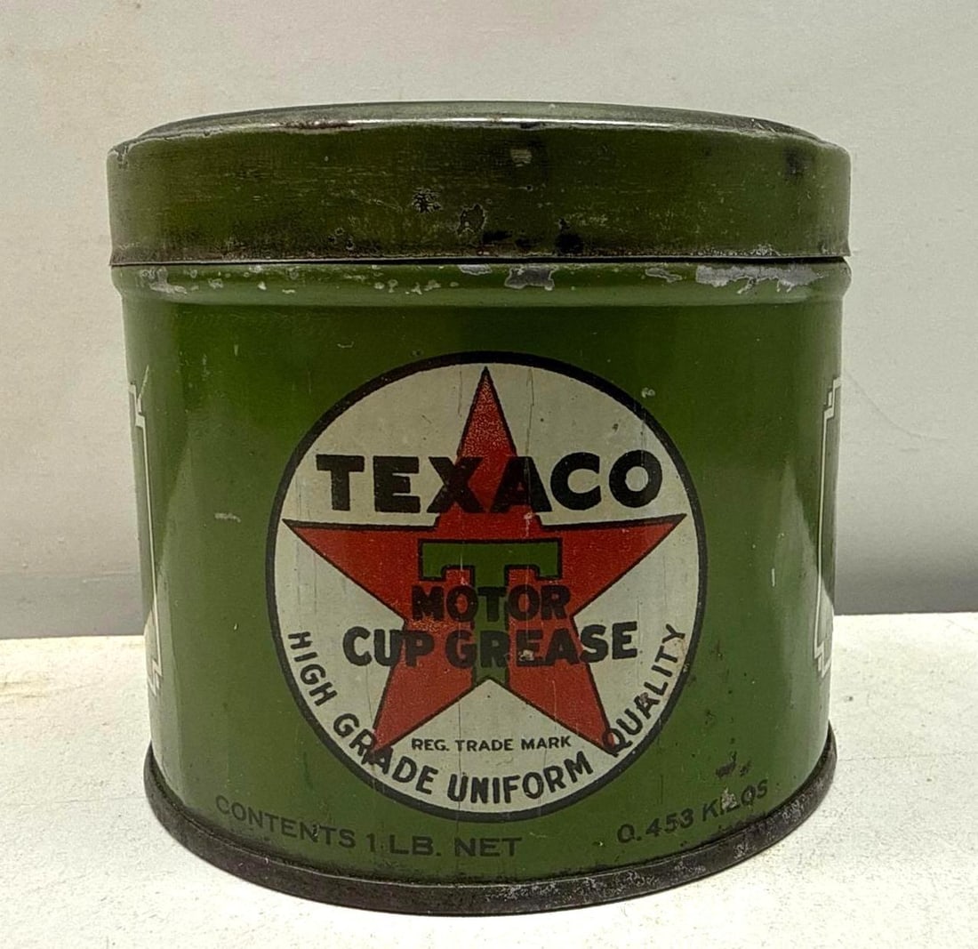 1920's Texaco Motor Cup Grease One Pound Can: Texaco Motor Cup Grease one pound tin.? Well branded can dates to the 1920's and has advertising?on sides and lid.? Features early Port Arthur logo with red letter trim.? Presents with nice color and 