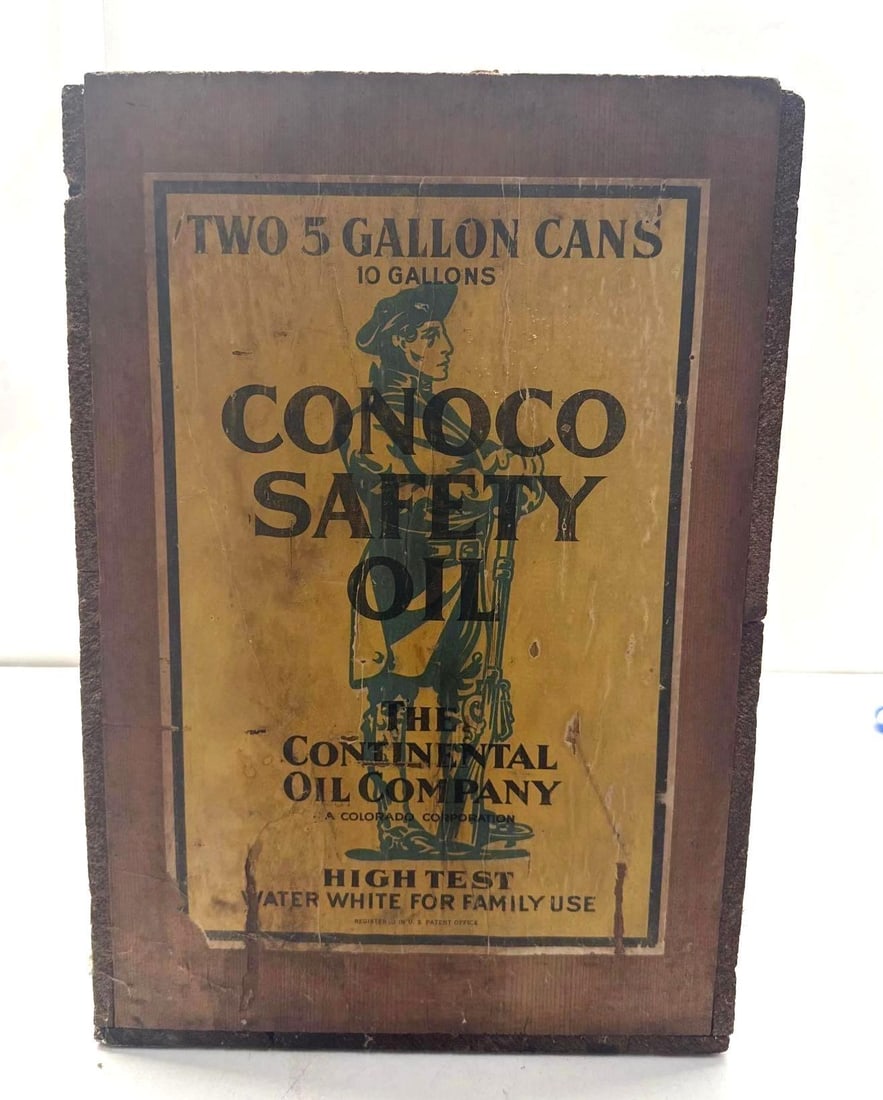 1920's Conoco Minuteman Safety Oil Wood Crate: Conoco Minuteman wood crate with paper label. Contains two five gallon square cans, and advertises "Safety Oil" with famous Minuteman image.? Presents with original paper label in nice conditon with s