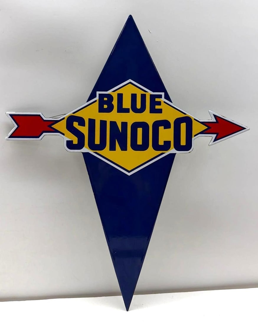 Porcelain Die-Cut Blue Sunoco Gas Pump Sign: Blue Sunoco die-cut porcelain gas pump sign.? Features die-cut straight arrow logo. Presents with excellent color and minor wear. Measures 19x22.