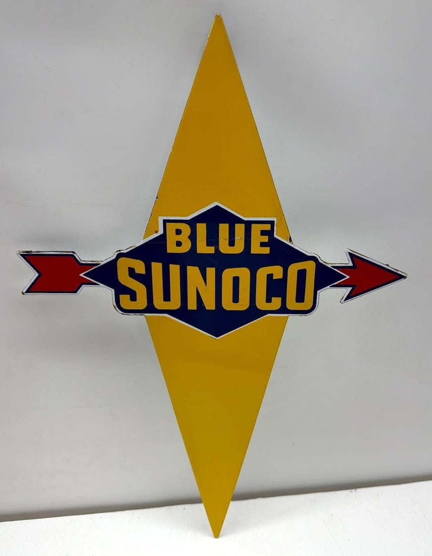 Blue Sunoco Die-Cut Porcelain Gas Pump Sign: Blue Sunoco die-cut single sided porcelain gas pump sign.??Features die-cut straight arrow logo design.? Presents with strong color and minor edge wear.? Measures 19x13.5.