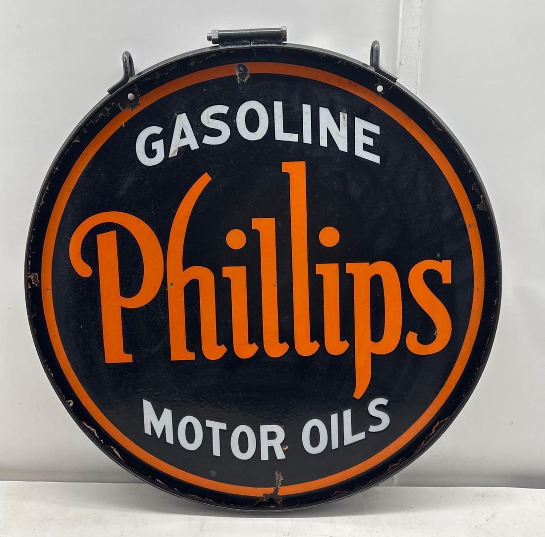 1920's 30" Phillips Motor Oil & Gasoline Porcelain Sign: Phillips Gasoline and Motor Oil double sided porcelain sign.? Early Phillips sign dates to the mid 1920's and is equipped with a high quality hanging ring.? Presents with strong color and minor wear.?