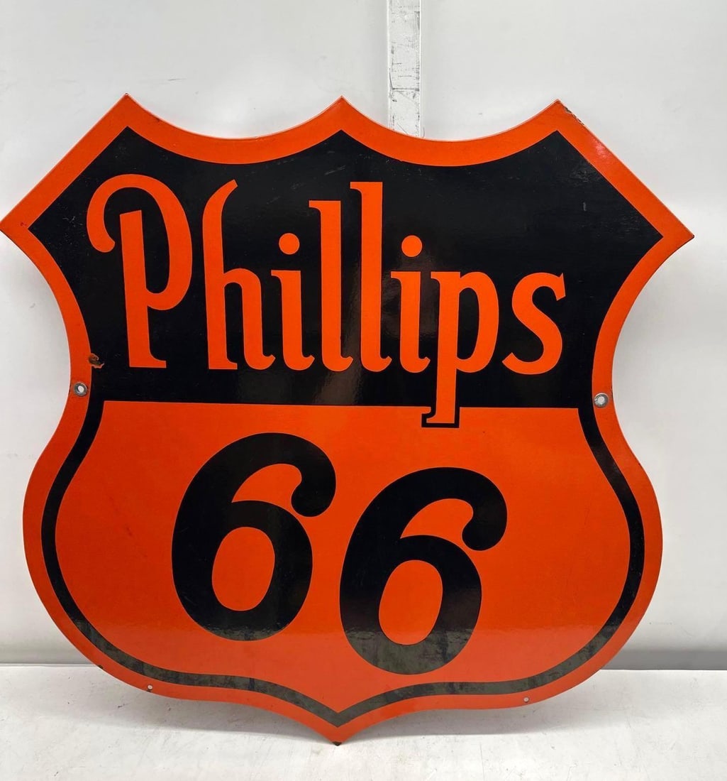 30" Phillips 66 Porcelain Curb Sign: Phillips 66 double sided die-cut shield curb sign.? Presents with outstanding color and minor wear.? Measures 30"