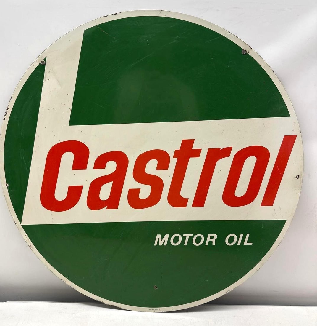 24" Castrol Motor Oil Sign: Castrol Motor Oil Sign. Double sided painted metal marked Scioto '74. Presents with nice color and light wear.