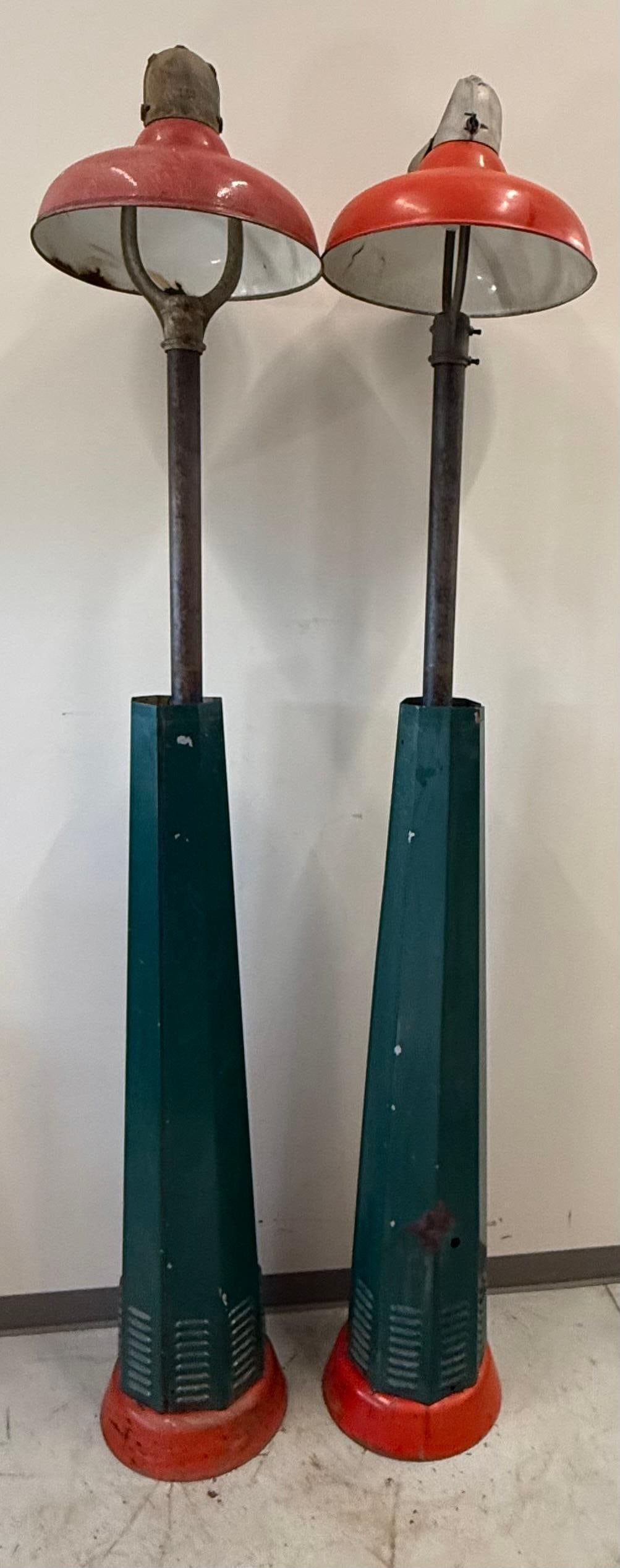 Two Octagon Filling Station Island Light Poles: A pair of matching octagon filling station island light poles with shades.? Both present with older paint and are solid.