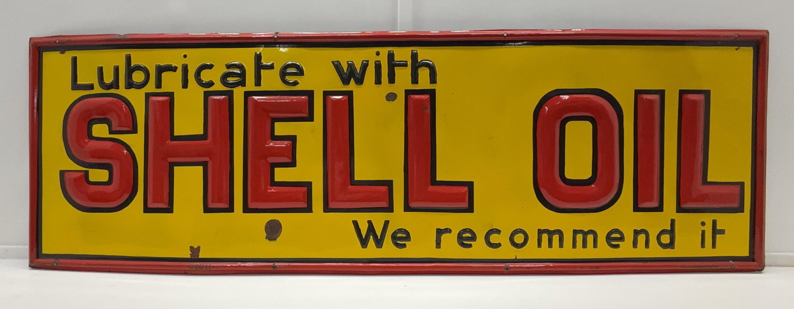 Lubricate With Shell Oil "We Recommend" Embossed Porcelain Sign (1 of 2)