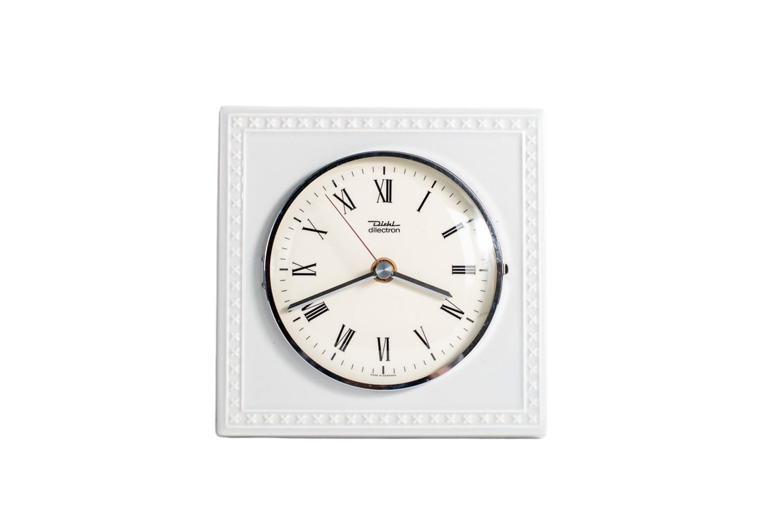 DIEHL Mid-Century Ceramic Wall Clock - Made in Germany: DIEHL Mid-Century Ceramic Wall Clock, a vintage masterpiece from the 1960s. Crafted in Germany, this elegant timepiece is a true representation of the Mid Century-Modern era. Featuring a modernistic r