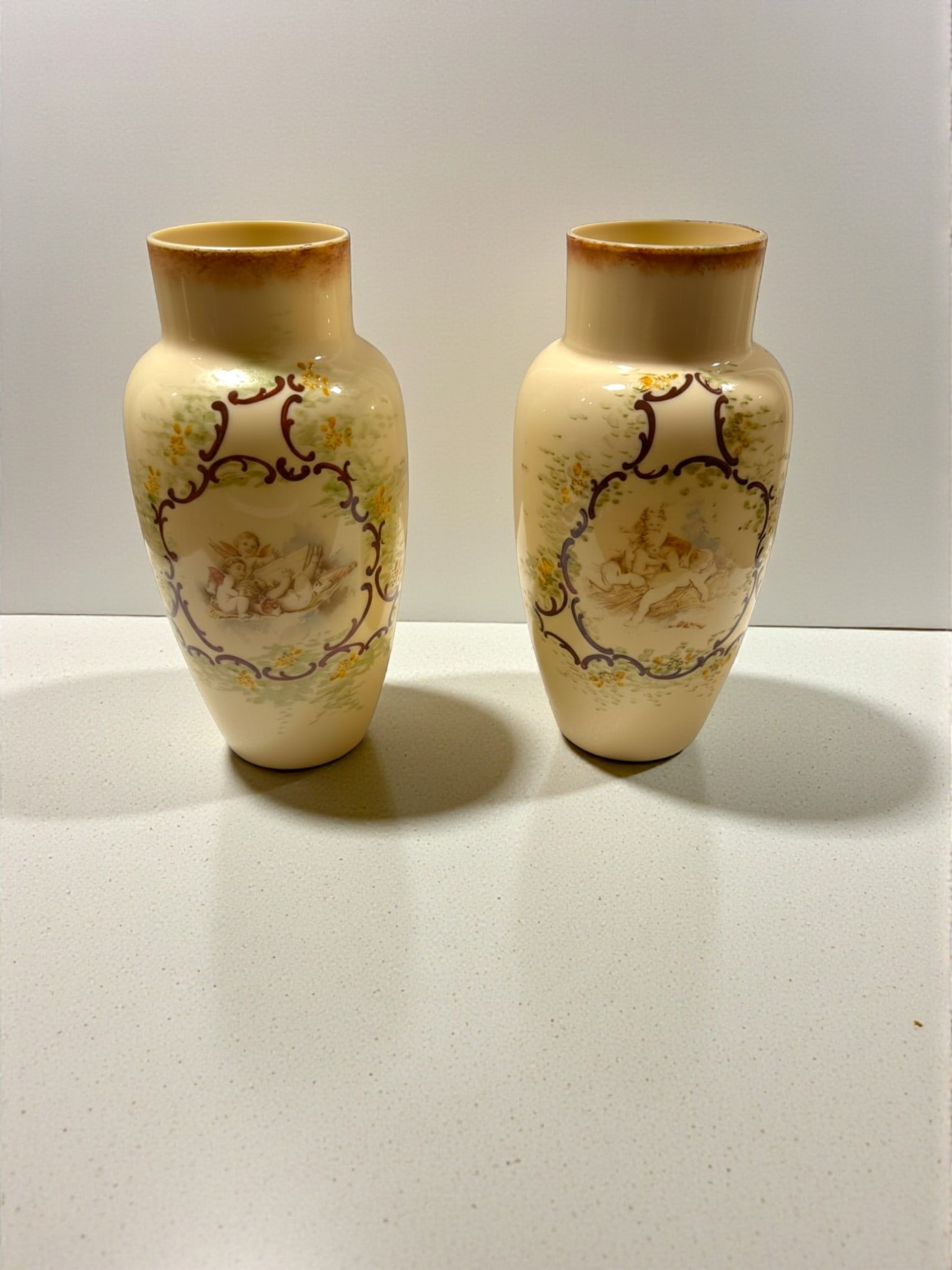 High Quality Two Large Early 20th Century Porcelain Blush Ivory Vases with Floral and Cherub D?cor (1 of 8)