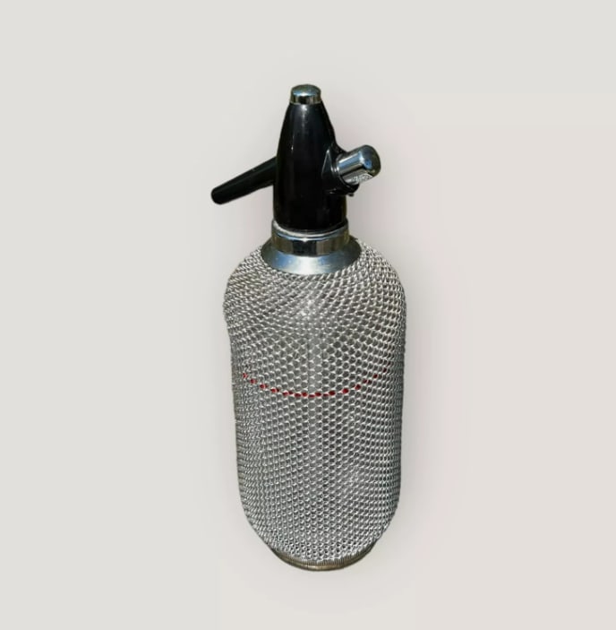 High Quality Two Large Early 20th Century Porcelain Blush Ivory Vases with Floral and Cherub D?cor: This high-quality pair of early 20th-century porcelain blush ivory vases features beautifully modeled cherubs, raised floral d?cor, and soft gradient ivory tones characteristic of fine European artist