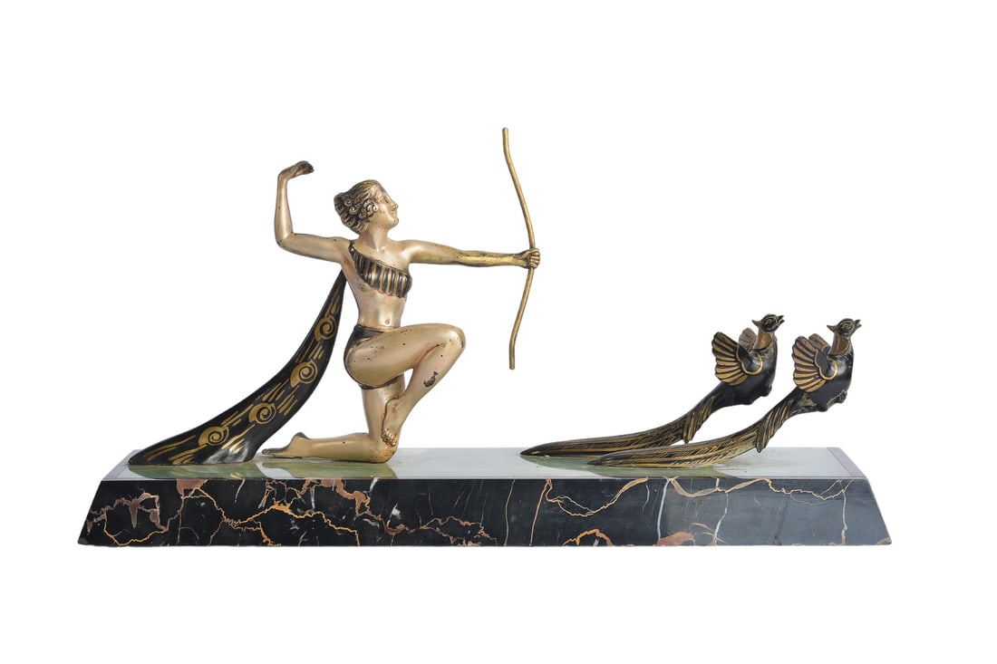 Original Art Deco Sculpture in Marble and Bronze from Uriano, France of Diana the Huntresse Goddess: Large Art Deco "Diana the Huntress" sculpture on a marble base. This classic French piece from the 1920s depicts a woman with a bow, shooting at a pair of flying pheasants. Although unsigned, it is by