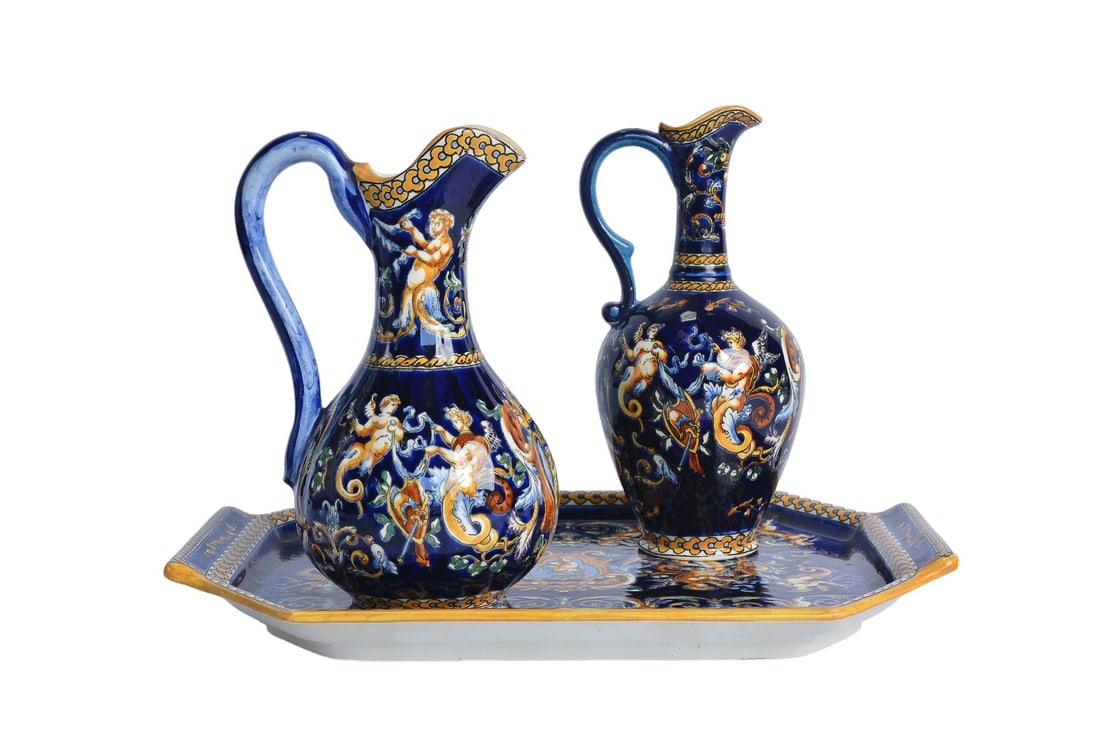 Antique Gien France Renaissance Hand Painted Faience Fond Blue CherubsTray with Two Pitchers: This exquisite Antique Gien France Renaissance Hand Painted Faience Fond Blue Cherubs Faience Tray set includes a beautifully detailed tray and two matching pitchers. The tray measures approximately 1