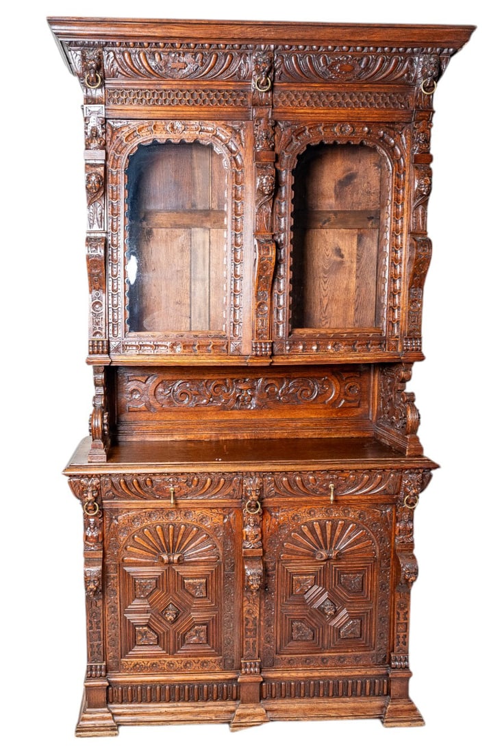 19th Century Antique French Breton Handcarved Oak Wood Renaissance Cabinet Buffet: This 19th Century Antique French Breton Hand-Carved Oak Renaissance Cabinet Buffet showcases masterful craftsmanship and timeless elegance. Made from solid oak, it features intricate hand-carved detai